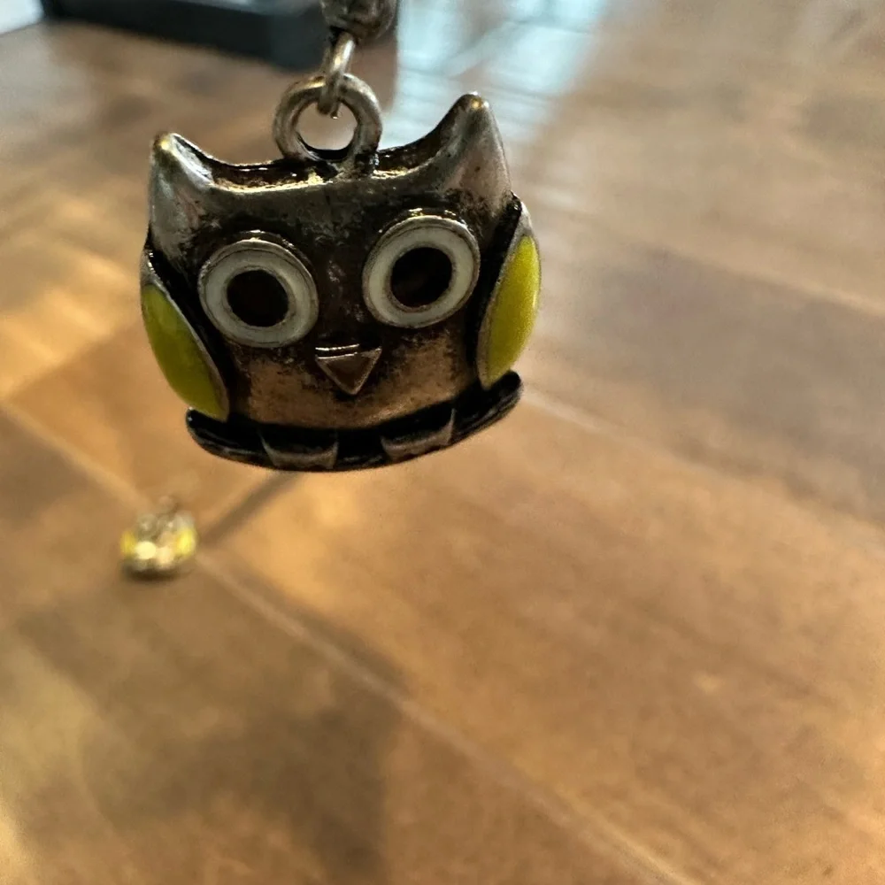 Owl earrings- silver color and yellow detail